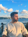 MÜCAHİT  BAŞTUĞ