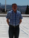 HİKMET FAHİR AÇIKGÖZ